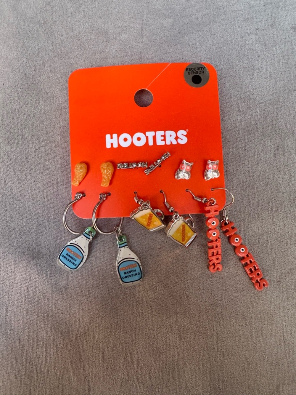 Hooters Multi-Pair Novelty Earring Set in Orange, Gold, Blue